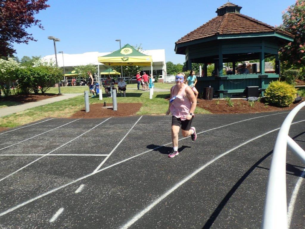 Carybeth running on the track
