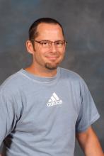 Bob Lonnee-Smiling guy with graying hair and small beard