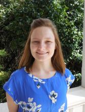 Headshot of Stephanie Haynes, a smiling blonde haired woman named Stephanie Haynes that is wearing a blue shirt.